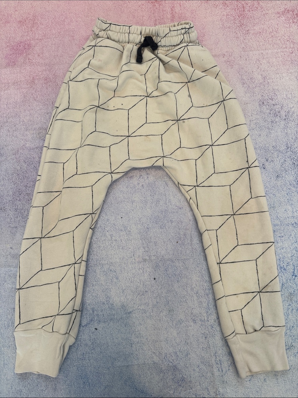 nununu Cream Joggers with Black Geometric Lines